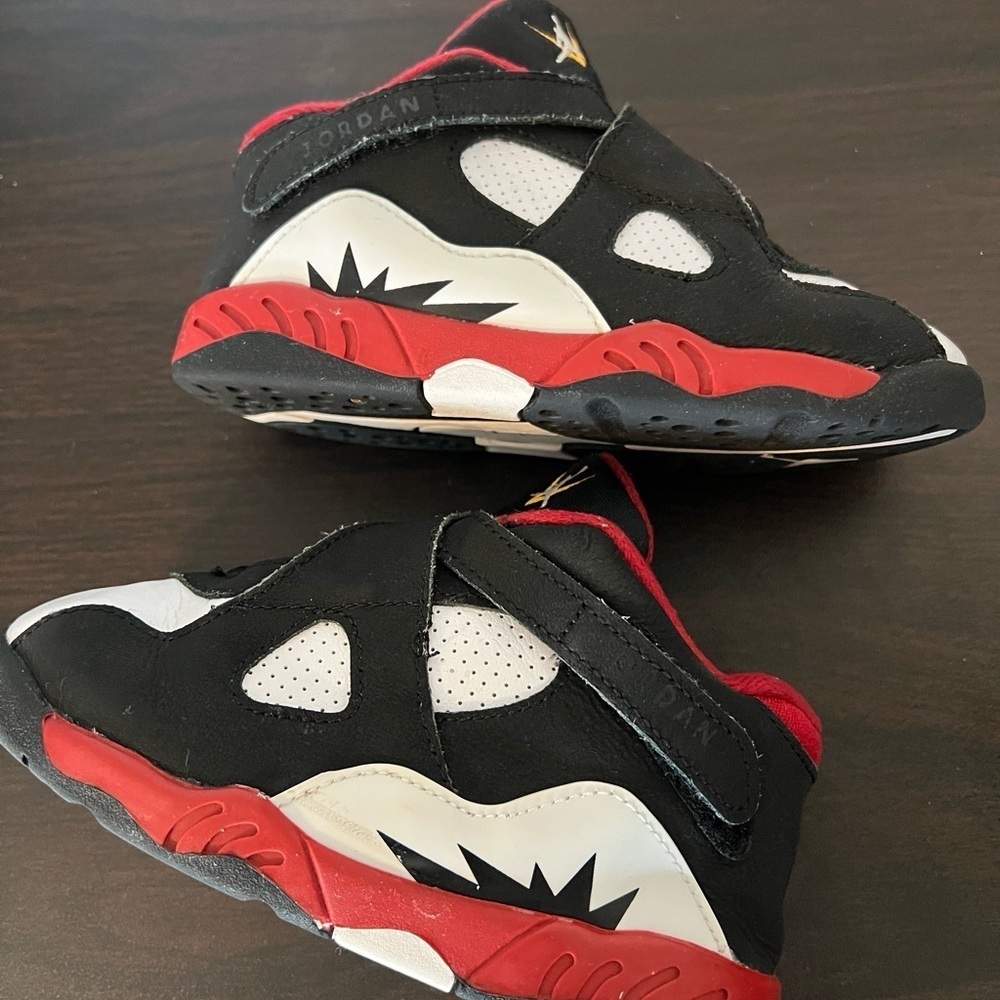 Jordan Black and Red Sneakers with Cross-Straps